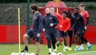 Manchester United's Wayne Rooney with team mates during training Reuters / Andrew Yates Livepic
