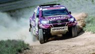 Qatar's Nasser Saleh Al Attiyah and his navigator Matthieu Baumel of Toyota Hilux Overdrive team in action during the third stage of Rally Kazakhstan yesterday.
