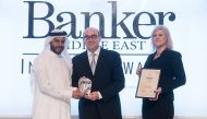 Omar Bouhadiba, Managing Director of ibq, receiving one of the  awards given to ibq at the 'Banker Middle East Industry Awards 2017' in Dubai, recently. 