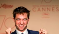 British actor Robert Pattinson talks on May 25, 2017 during a press conference for the film 'Good Time' at the 70th edition of the Cannes Film Festival in Cannes, southern France. / AFP / Laurent EMMANUEL
