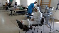 A woman, who was wounded in Syria, rests inside a hospital in Tripoli, Lebanon May 23, 2017. Picture taken May 23, 2017.REUTERS/Mohamed Azakir