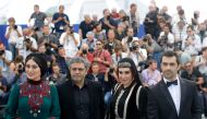 Iranian director Mohammad Rasoulof, cast members Nasim Adabi, Mohammad Akhlaghirad and Soudabeh Beizaee pose for a picture at 70th Cannes Film Festival on  May 19, 2017. Reuters / Stephane Mahe



