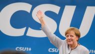 German Chancellor Angela Merkel waves after delivering a speech during a joint campaigning event of the Christian Democratic Union (CDU) and the Christion Social Union (CSU) in Munich, southern Germany, on May 27, 2017. - Germany OUT / AFP / dpa / Matthia
