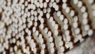 Cigarettes are seen during the manufacturing process in the British American Tobacco Cigarette Factory (BAT) in Bayreuth, southern Germany, April 30, 2014. British American Tobacco, the world's No. 2 cigarette maker, posted improved sales volume for the f