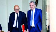 French Minister of Europe and Foreign Affairs Jean-Yves Le Drian (L) and Territorial Cohesion Minister Richard Ferrand (R) leave the Elysee Palace after a weekly cabinet meeting in Paris, France, May 31, 2017. Reuters/Charles Platiau