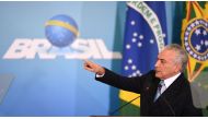 Brazilian President Michel Temer delivers a speech during the inauguration ceremony of the new Minister of Justice, Torquato Jardim at the Planalto Palace in Brasilia, on May 31, 2017.  AFP / EVARISTO SA
