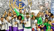In this handout image provided by UEFA, Sergio Ramos of Real Madrid lifts the trophy after Real Madrid won the UEFA Champions League final football match between Juventus and Real Madrid at The Principality Stadium in Cardiff, south Wales.