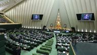 (FILES) This file photo taken on March 01, 2016 shows Iranian MPs attending a parliament session in Tehran on March 1, 2016. AFP / ATTA KENARE