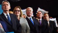 Britain's Chancellor of the Exchequer Philip Hammond (L), Britain's Home Secretary Amber Rudd (2nd L), Britain's Defence Secretary Michael Fallon (C) attend a general election campaign rally in Birmingham on June 7, 2017. AFP / Ben Stansall