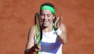 Latvia's Jelena Ostapenko celebrates after winning her  French Open semi-final against Switzerland's Timea Bacsinszky in Paris yesterday.