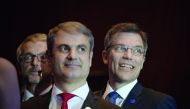 Riku Huttunen (right), Director-General of Finland's Energy Department of the Ministry of Employment and the Economy, attends the Clean Energy Ministerial international forum that concluded in Beijing, yesterday. Officials and business leaders from around