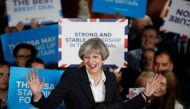 FILE PHOTO - Britain's Prime Minister Theresa May reacts during an election campaign event in Bradford, Britain, June 5, 2017. REUTERS/Phil Noble/File Photo

