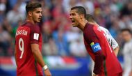 Portugal's forward Cristiano Ronaldo (R) reacts next to Portugal's forward Andre Silva during the 2017 Confederations Cup group A football match between Portugal and Mexico at the Kazan Arena in Kazan on June 18, 2017. / AFP / Yuri CORTEZ