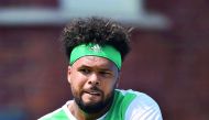 France's Jo-Wilfried Tsonga returns against France's Adrian Mannarino in their first round match at Queen's Club Championships in London, yesterday. 