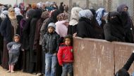 File picture of syrian refugees waiting for aid packages at Al Zaatari refugee camp in the Jordanian city of Mafraq, near the border with Syria, January 20, 2016. Reuters
