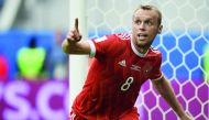 Russia's midfielder Denis Glushakov celebrates after scoring a goal against New Zealand in their Confederations Cup match at the Krestovsky Stadium in Saint-Petersburg,  in this June 18 file picture.