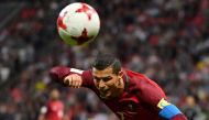 Portugal's forward Cristiano Ronaldo heads the ball during the 2017 Confederations Cup semi-final football match between Portugal and Chile at the Kazan Arena in Kazan on June 28, 2017. AFP / Yuri CORTEZ