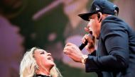 (FILES) This file photo taken on November 4, 2016 shows Beyonce (L) and Jay Z perform during a Get Out the Vote (GOTV) performance in Cleveland, Ohio. AFP / Brendan Smialowski