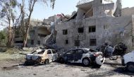 Damaged cars are seen at one of the blast sites in Damascus in this handout picture posted on SANA on July 2, 2017, Syria. / Reuters.