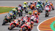 Repsol Honda Team's Spanish rider Marc Marquez leads the pack during the MotoGP competition of the Moto Grand Prix of Germany at the Sachsenring Circuit on July 2, 2017 in Hohenstein-Ernstthal, eastern Germany. (AFP / Robert MICHAEL)
