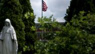 A statue of Mary, Mother of Jesus, in front of Seton Keough High School, formerly Archbishop Keough High School, where Sister Catherine Cesnik worked before her 1969 murder June 23, 2017 in Baltimore, Maryland. 