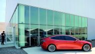 A prototype of the Tesla Model 3 on display in front of the Tesla Gigafactory which will produce batteries for the electric carmaker in Sparks, Nevada,US