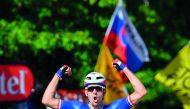 France's Arnaud Demare celebrates as he crosses the finish line at the end of the 207,5 km fourth stage of Tour de France.