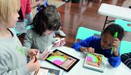Students working with the WISE Accelerator project Joko’s World interactive learning applications.
