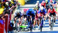 Great Britain's Mark Cavendish (left) falls near the finish line at the end of the fourth stage of the 104th edition of the Tour de France cycling race on Tuesday between Mondorf-les-Bains and Vittel. Tour de France jury yesterday kicked world champion Pe