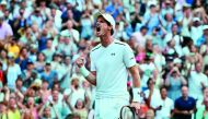 Britain's Andy Murray celebrates beating Italy's Fabio Fognini during their men's singles third round match on the fifth day of the 2017 Wimbledon Championships at The All England Lawn Tennis Club in Wimbledon, southwest London, on Friday.