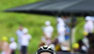 France's Lilian Calmejane celebrates as he crosses the finish line at the end of eighth stage of Tour de France.