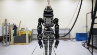 Bipedal humanoid robot Atlas. primarily developed by Boston Dynamics is presented during a news conference at the University of Hong Kong, October 17, 2013 (REUTERS / Tyrone Siu) 