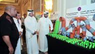 Sheikh Khalifa bin Jassim bin Mohammed Al Thani (centre), Chairman of Qatar Chamber, and Abdulaziz bin Nasser Al Khalifa (right), CEO, QDB tour 