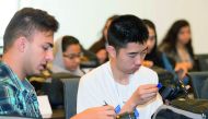 Muaaz Dembinski (left), a student at Dubai American Academy, and Peiheng Wu of Riverstone International School in the US, during the workshop. 