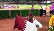 Qatar’s Abdulrahman Abdulqader celebrates his gold medal in London.