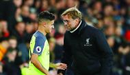 Liverpool’s Philippe Coutinho (left) speaks with manager Juergen Klopp during an EFL Cup match at St Mary’s Stadium, in Southampton, England in this file photo. 