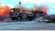 A picture released by the media office of Lebanon's Shiite militant group Hezbollah on July 21, 2017 shows an artillery firing towards militant jihadists' position in Jurud Arsal, a mountainous region bordering with Syria. Lebanon's powerful Hezbollah gro