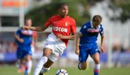 This file photo taken on July 15, 2017 shows Monaco’s forward Kylian Mbappe controling the balll during a friendly football match between AS Monaco and Stoke City FC in Martigny.