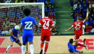 Bayern Munich’s Thomas Mueller (right) scores during their International Champions Cup match against Chelsea, played at the National Stadium in Singapore yesterday.