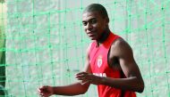 This file photo taken on July 10, 2017 shows Monaco’s French forward Kylian Mbappe arriving for a training session in La Turbie near Monaco.