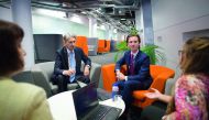 Britain’s Chancellor of the Exchequer Philip Hammond (second left) meets staff as he tours the IBM office in London, yesterday, as the preliminary estimates for 2017 second-quarter GDP are published. UK’s GDP grew by 0.3 percent between April and June, a 