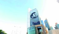 Image of the iconic “Tamim Al Majd” mural installed on the Commercial Bank Plaza building in West Bay.