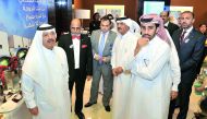 Sheikh Fahad bin Mohammad bin Jabor Al Thani (fourth left), Chairman of the Board of Directors;  Sheikh Abdul Rehman bin Mohammad bin Jabor Al Thani (left), Managing Director and Dr R Seetharaman (second left), Chief Executive Officer, Doha Bank with othe