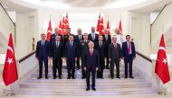 Turkish Supreme Military Council (YAS) members, Turkey's Prime Minister Binali Yildirim (C); (Front row L to R) Turkish Deputy Prime Ministers Hakan Cavusoglu, Fikri Isik, Bekir Bozdag, Turkish Military Chief of Staff General Hulusi Akar, Turkish Deputy P