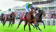 Jockey W Buick astride Barraquero (centre) extends lead on his way to win the Qatar Richmond Stakes (Group 2) event at the Qatar Goodwood Festival in West Sussex, England yesterday.