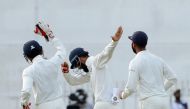 Indian cricketer Lokesh Rahul (C) celebrates with his teammates after takes a catch to dismiss Sri Lankan cricketer Upul Tharanga during the second day of the second Test match between Sri Lanka and India at the Sinhalese Sports Club (SSC) Ground in Colom