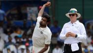 India's Ravichandran Ashwin delivers the ball during the third day of the second Test cricket match between Sri Lanka and India at the Sinhalese Sports Club (SSC) Ground in Colombo on August 5, 2017. / AFP / Lakruwan WANNIARACHCHI