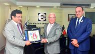 Mohammed Mehdi Al Ahbabi (left), presenting a memento to Turkish officials in Izmir, Turkey.