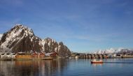 A fishing boat enters the harbour at the Arctic port of Svolvaer in northern Norway March 4,2013. Reuters/Alister Doyle
