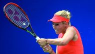 Donna Vekic of Croatia plays a shot against Eugenie Bouchard of Canada during the fourth day of the Rogers Cup at Aviva Centre in Toronto, Canada on Tuesday. The Canadian lost 6-3, 6-4.
